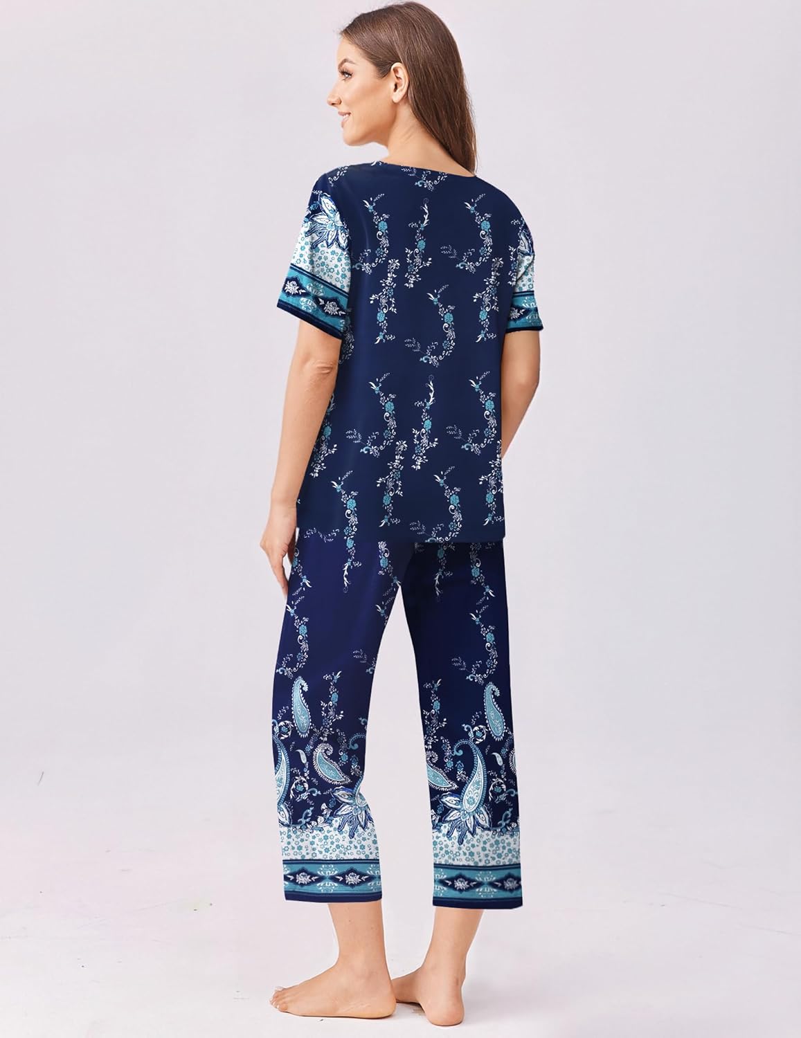 Floral capri pajama set with short sleeves, navy blue floral print on top and pants