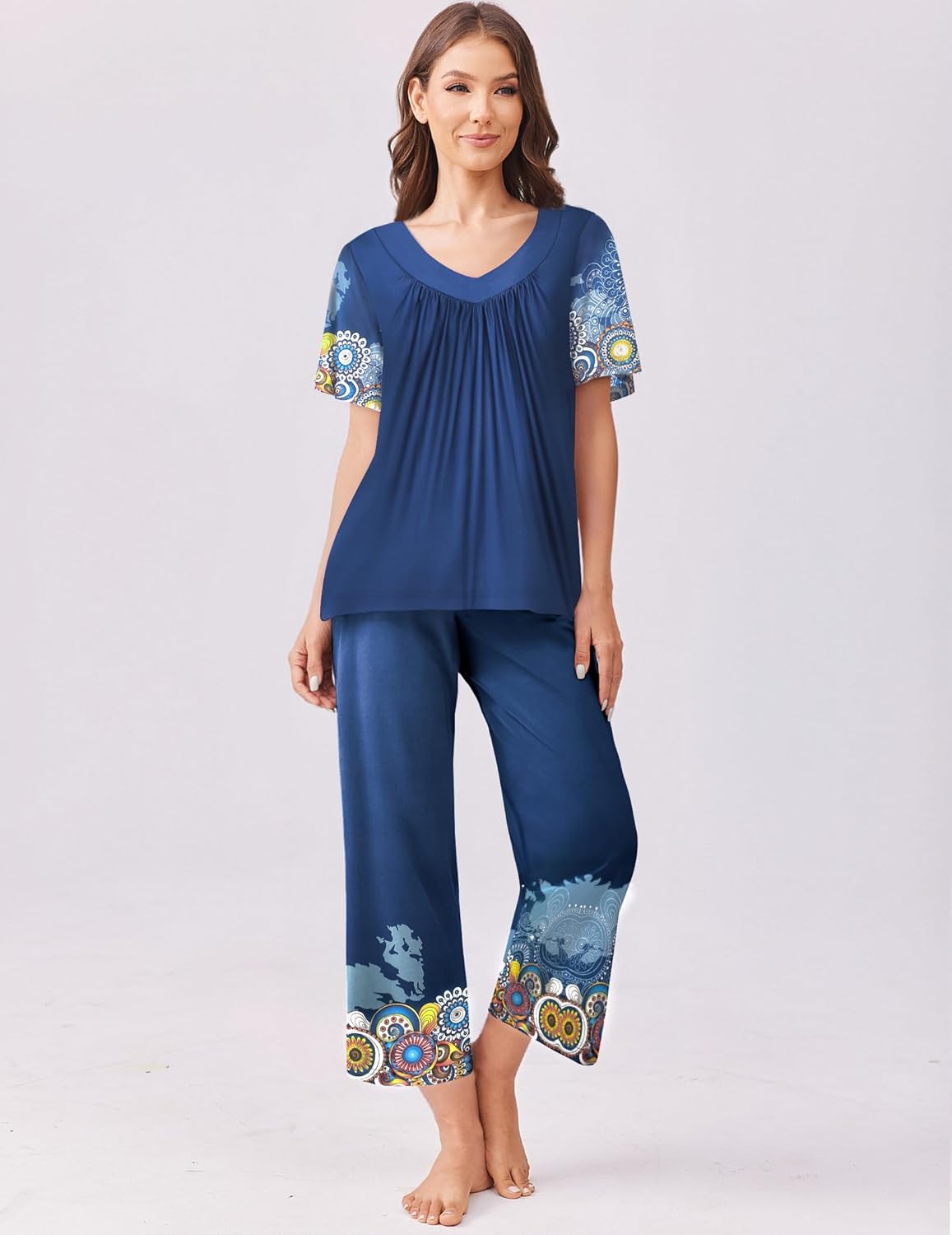 Blue short-sleeve pajama top and capri pants set with colorful border print