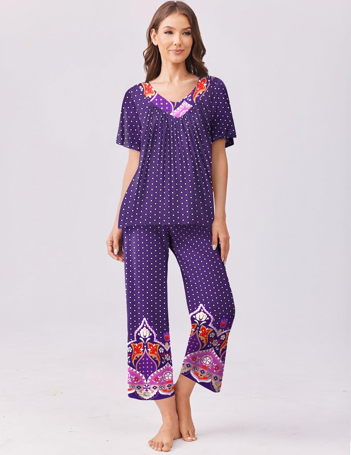 Floral capri pajama set with short sleeves, purple dotted top and pants with bright motifs