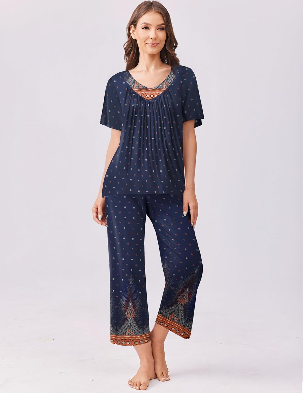 Navy short-sleeve pajama top and capri pants set with tiny star print and border hems