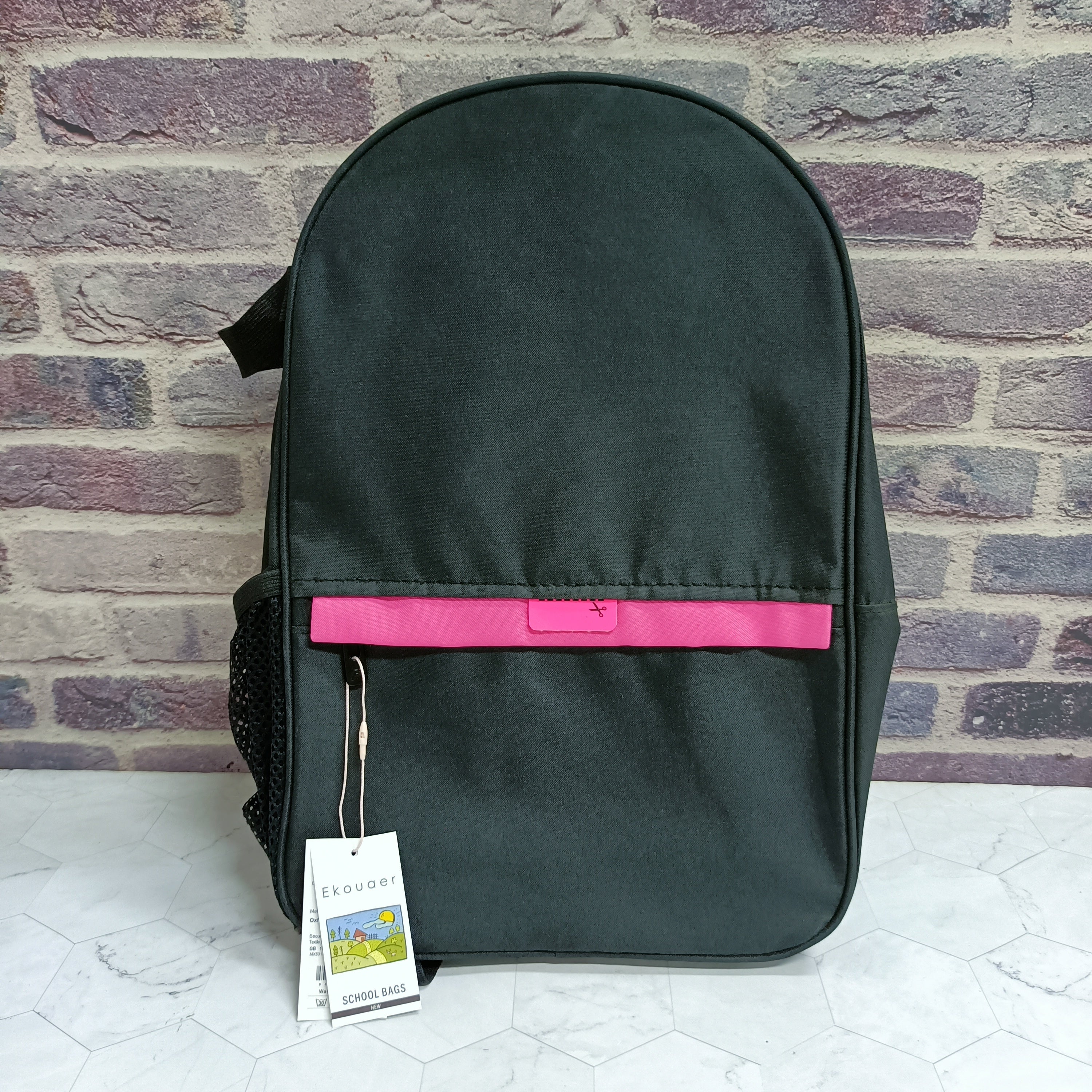 Black backpack with pink front accent bar and zip pocket, front view