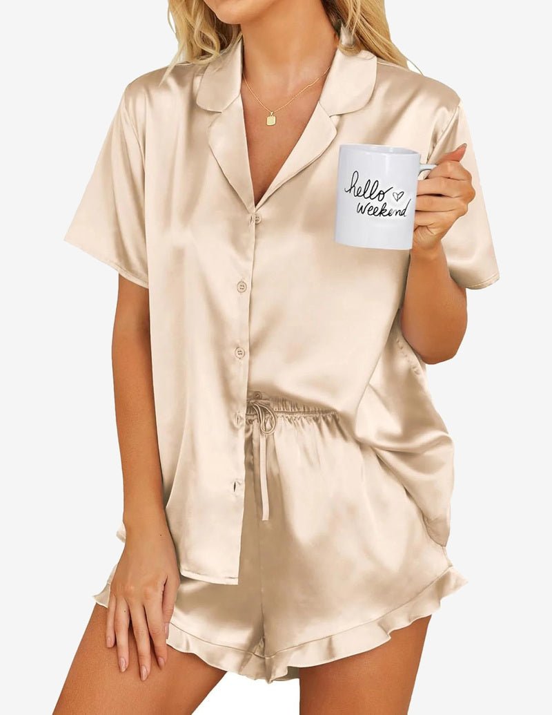 Girls satin pajama set in champagne, short sleeve button top with ruffled drawstring shorts