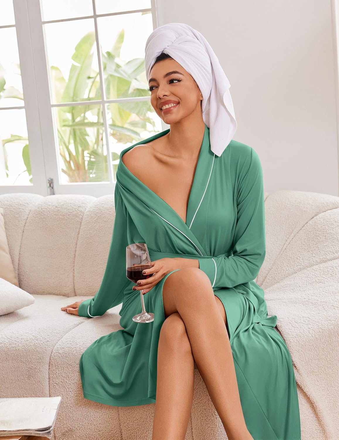 Celadon green long kimono robe with contrast piping and wrap tie, worn seated