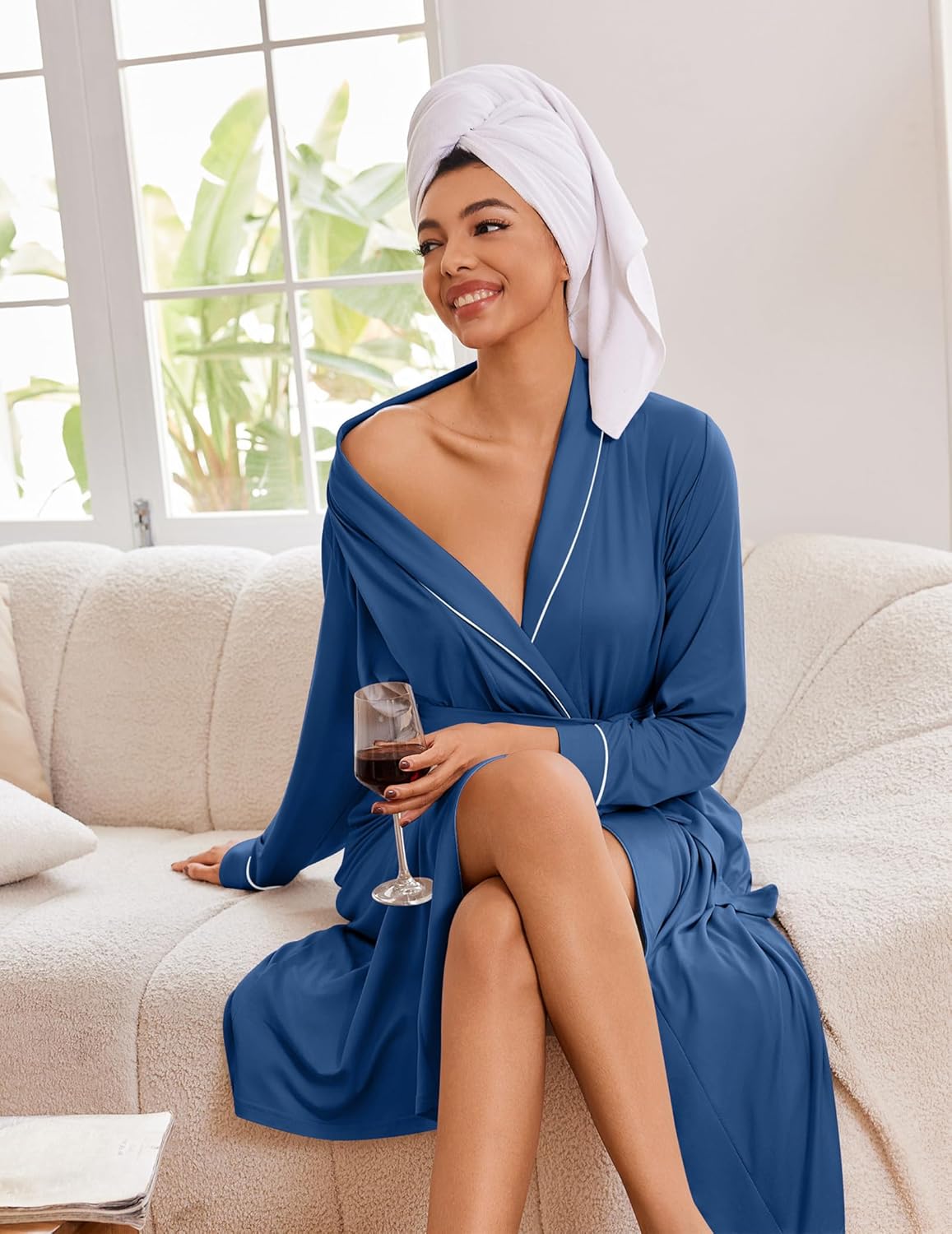 Dark blue knit bathrobe with V-neck wrap, tie waist, and long sleeves