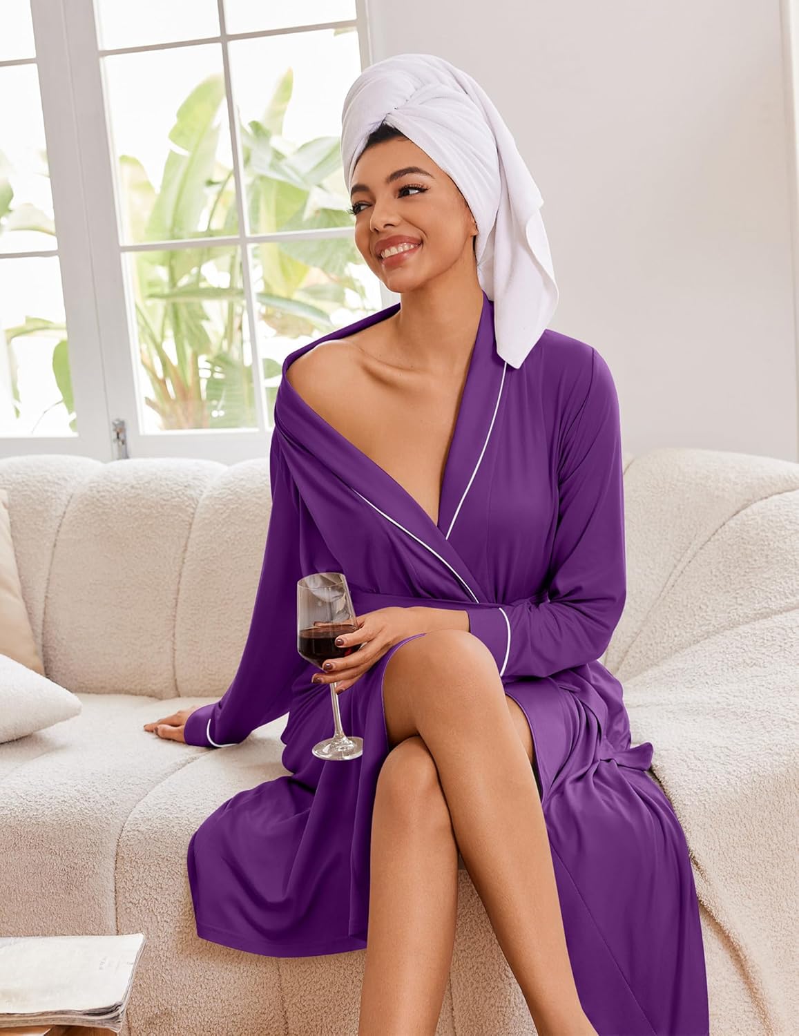 Deep purple kimono robe with white-trim piping, long sleeves, and tied waist
