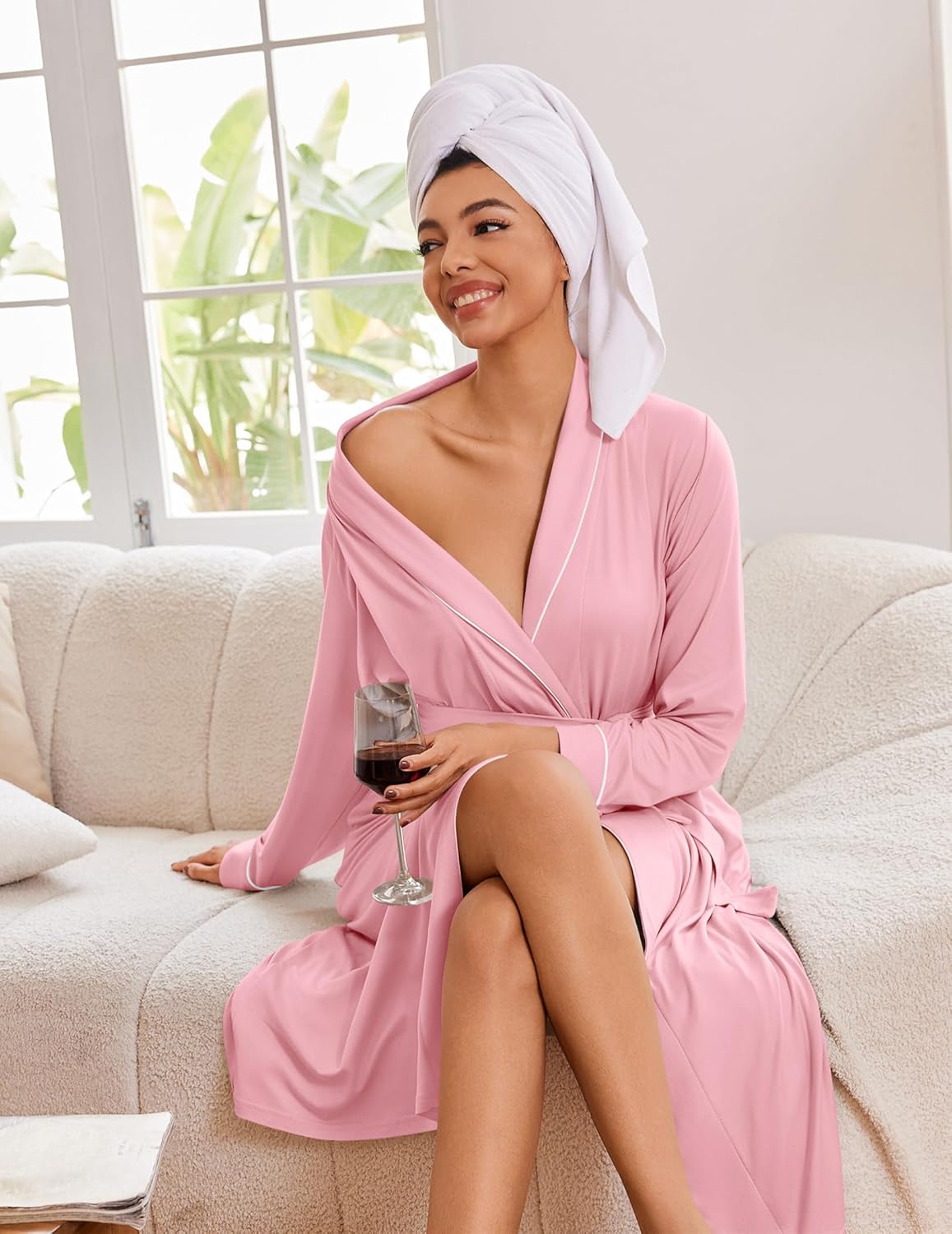 Pink satin-like knit bathrobe with V-neck and tie waist, long sleeves