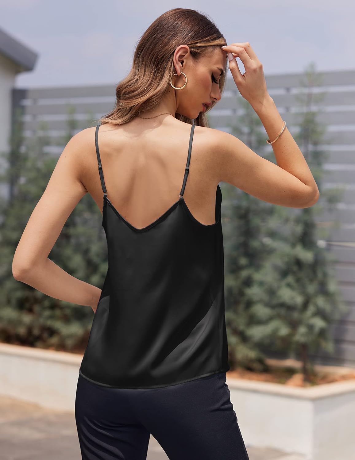 Black satin pajama tank from back view, V-shaped neckline and thin shoulder straps