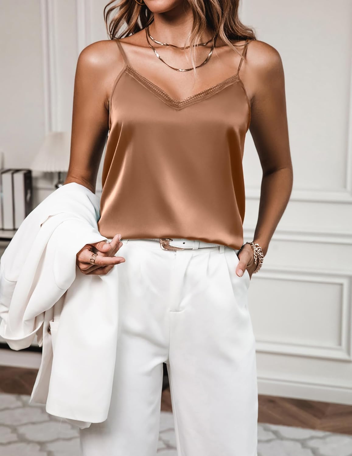 Champagne satin camisole with lace-trim V neckline, spaghetti straps, drapes smoothly