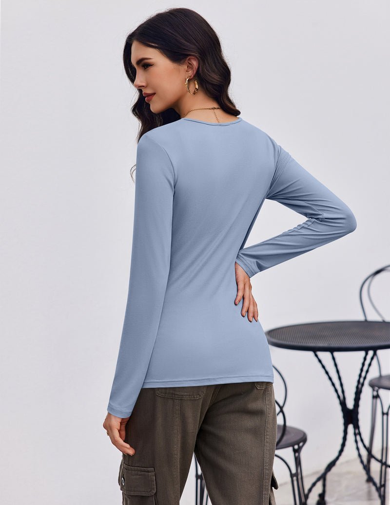 Light blue long-sleeve scoop-neck fitted top, side view