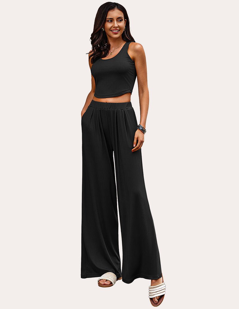 Black ribbed crop top with wide-leg pajama trousers, matching lounge set