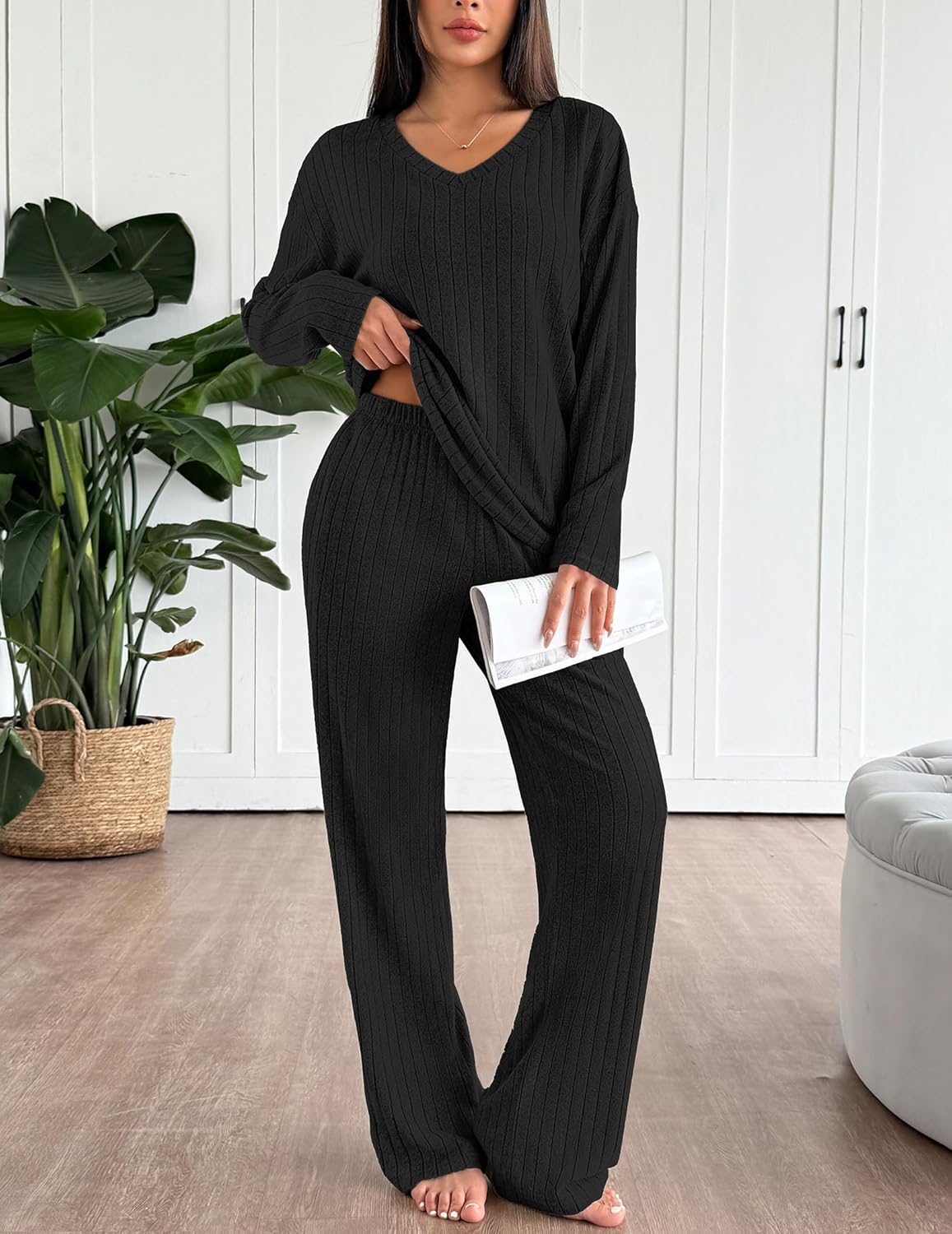 Black ribbed pajama lounge set with long sleeves, V-neck top, and straight-leg pants