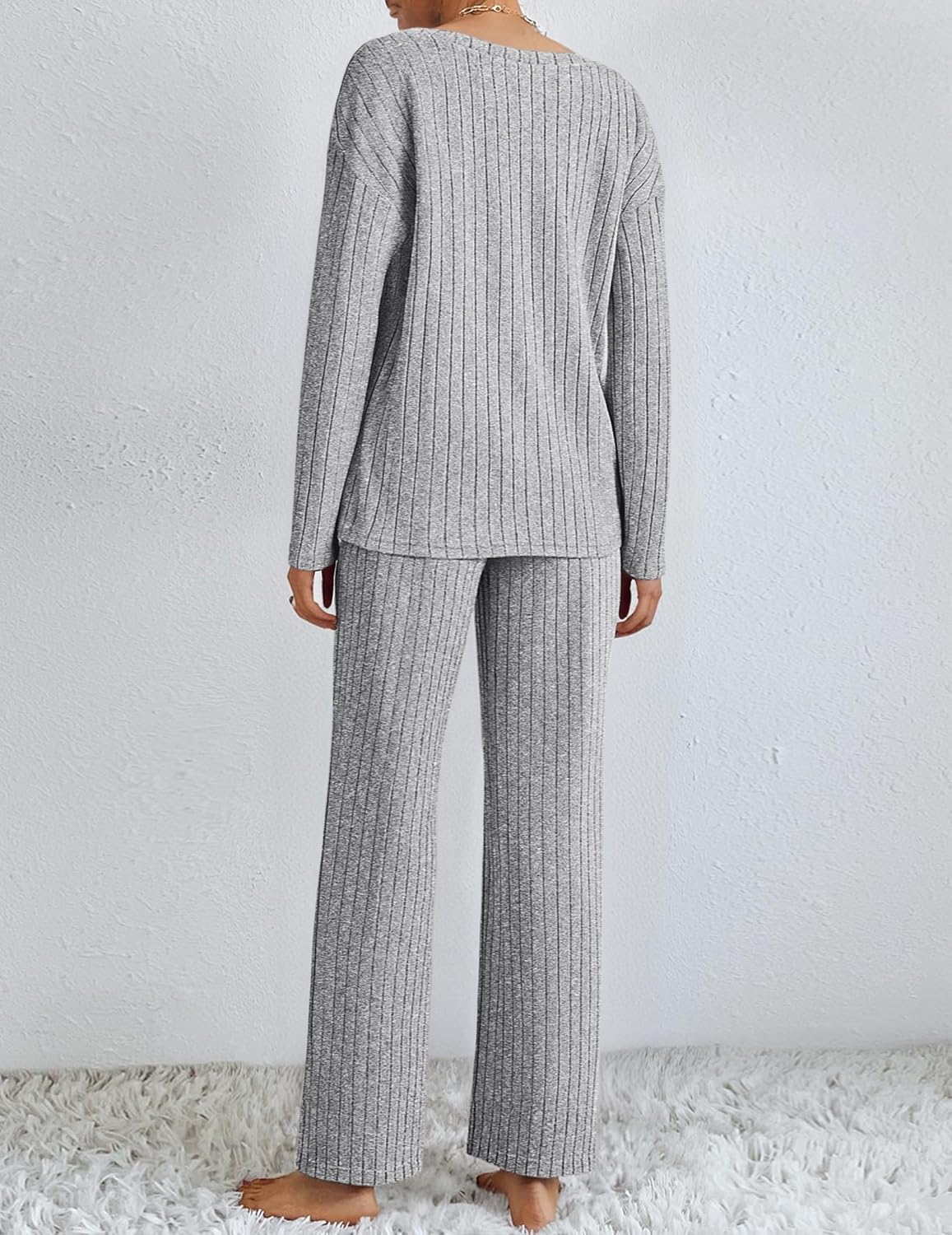Back view: dark gray ribbed knit pajama set with long-sleeve top and full-length pants