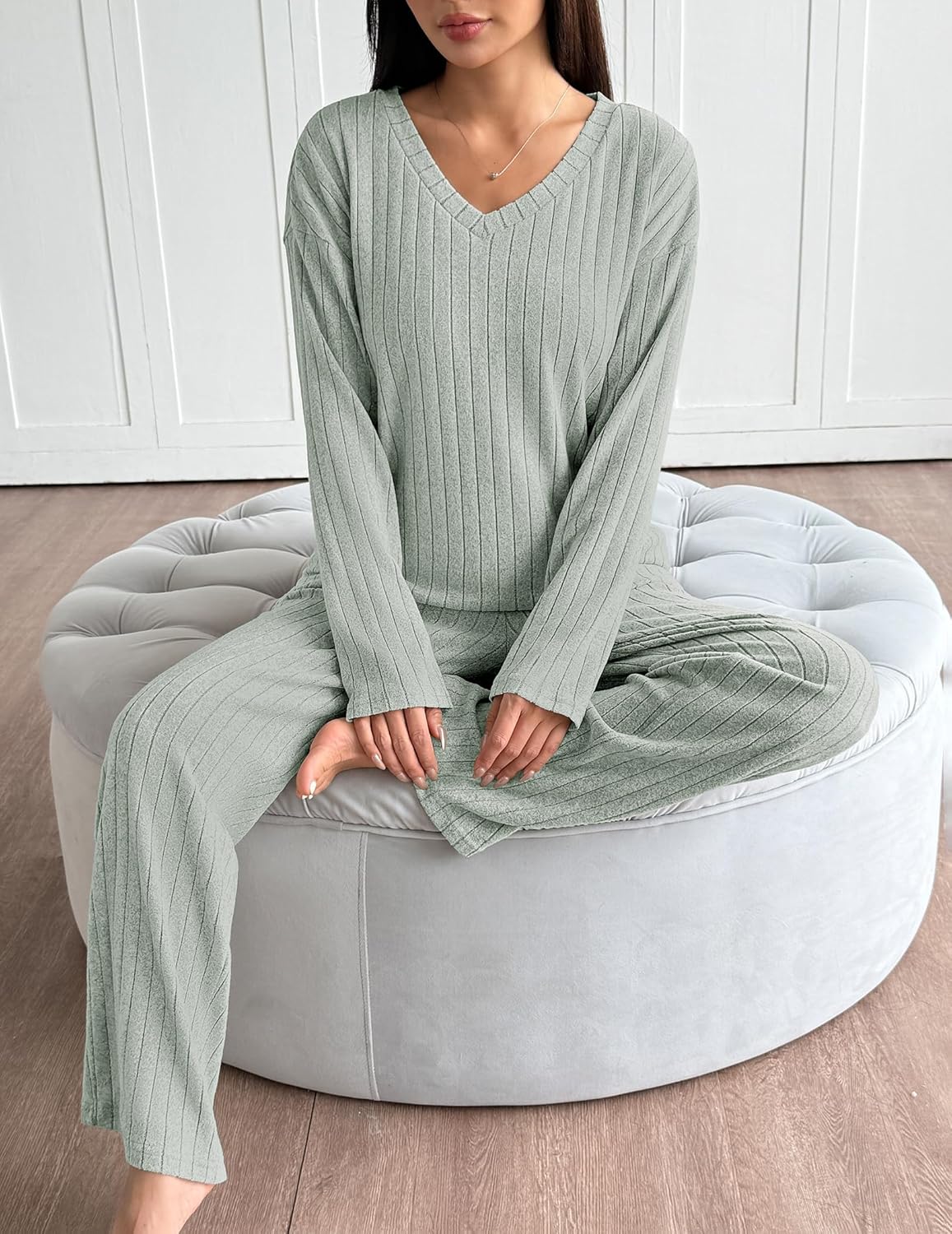 Light green ribbed knit pajama set: long-sleeve V-neck top with ribbed trousers