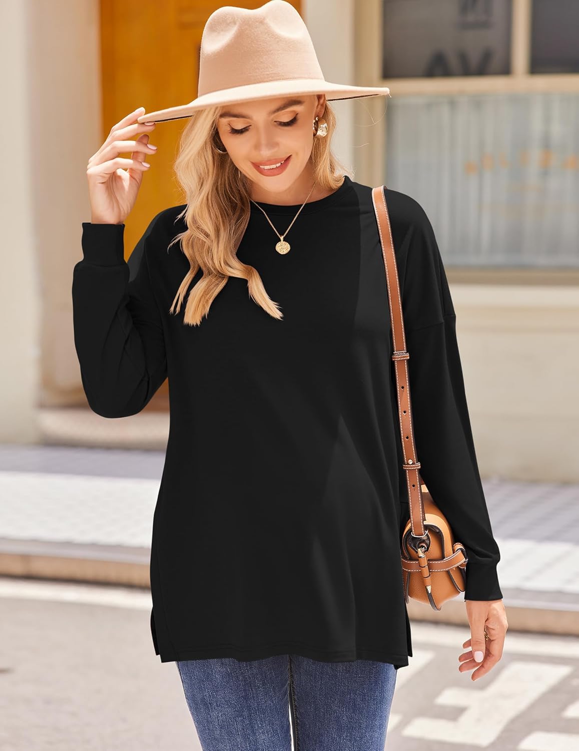 Black long-sleeve maternity shirt with split side hem, straight tunic length