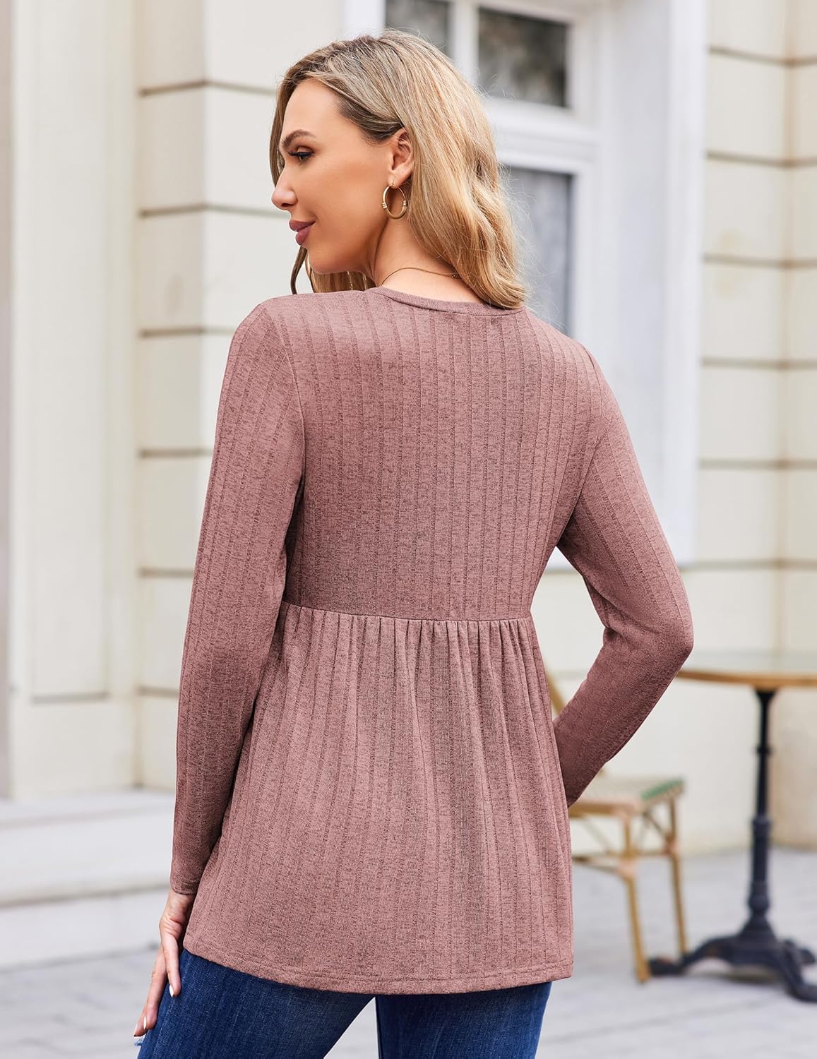 Back view: dusty rose long-sleeve maternity tunic blouse with pleated empire waist