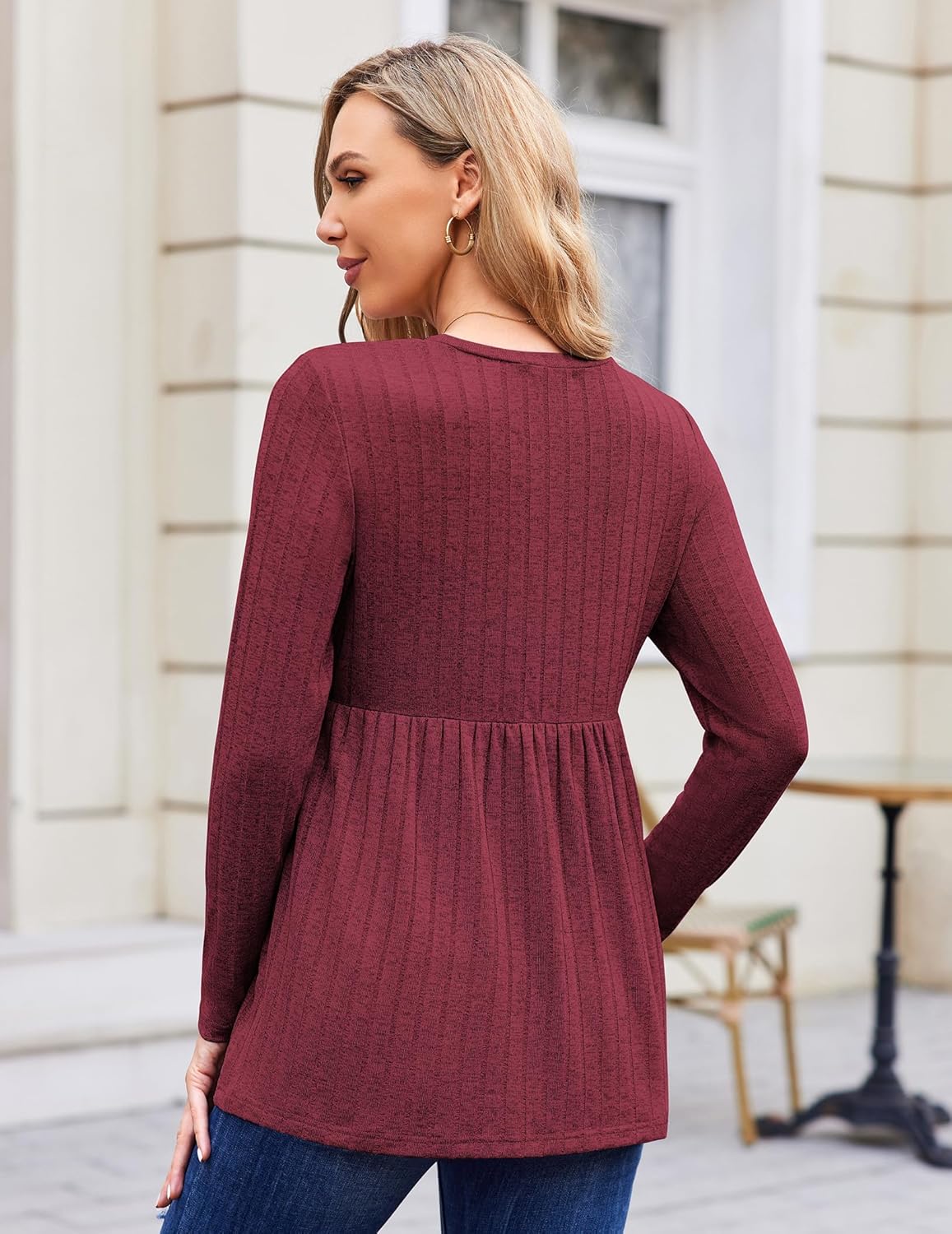 Back view: wine red long-sleeve maternity tunic blouse with empire waist pleats
