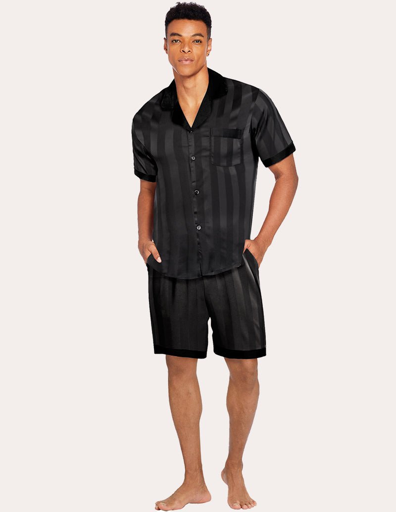 Dark black satin pajama set for men with subtle vertical sheen: button shirt and matching shorts