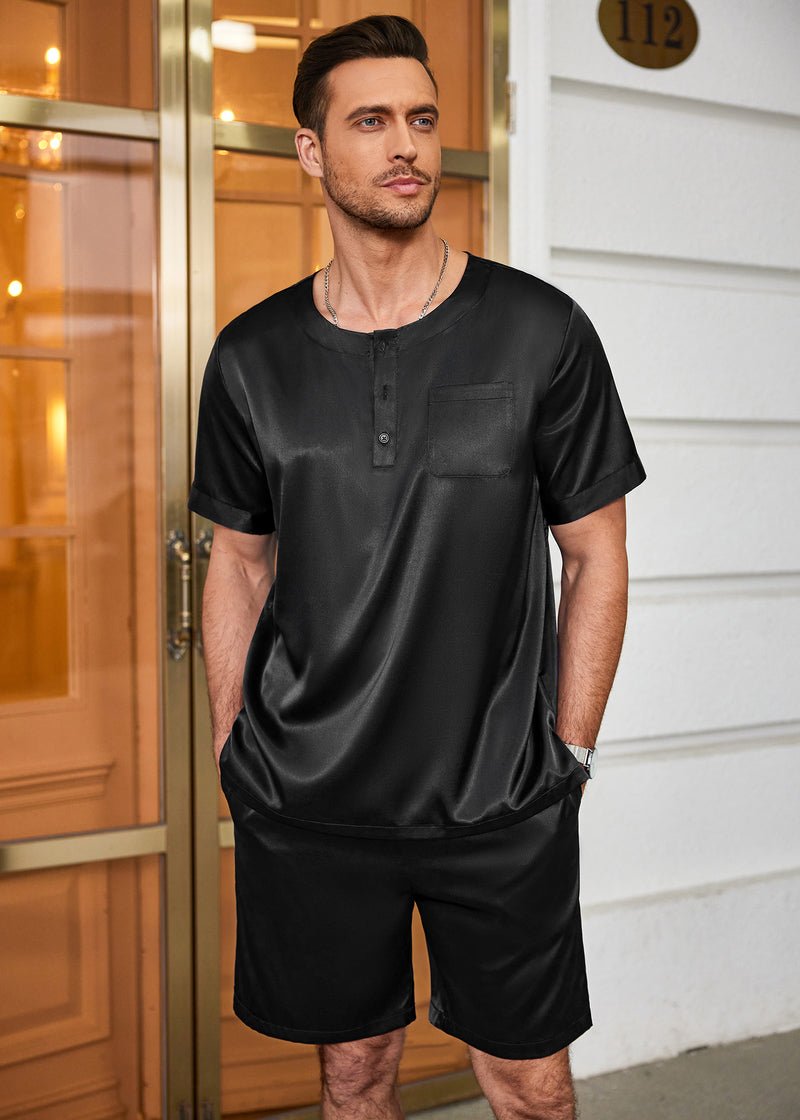 Men's satin pajama set in black: button-front top with pocket and relaxed-fit shorts
