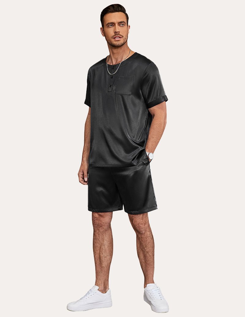Men's satin pajama set in dark gray/black: henley short-sleeve top with matching shorts