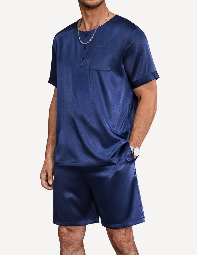 Navy blue satin pajama set: short-sleeve henley with pocket, matching knee-length shorts