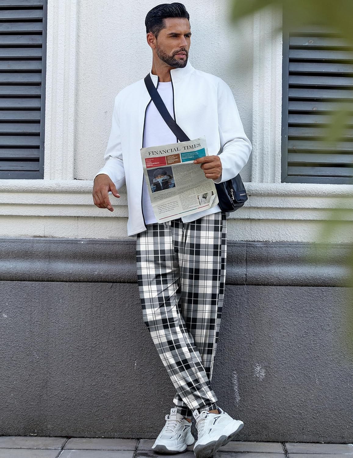 Black-and-white plaid pajama pants with elastic drawstring waistband