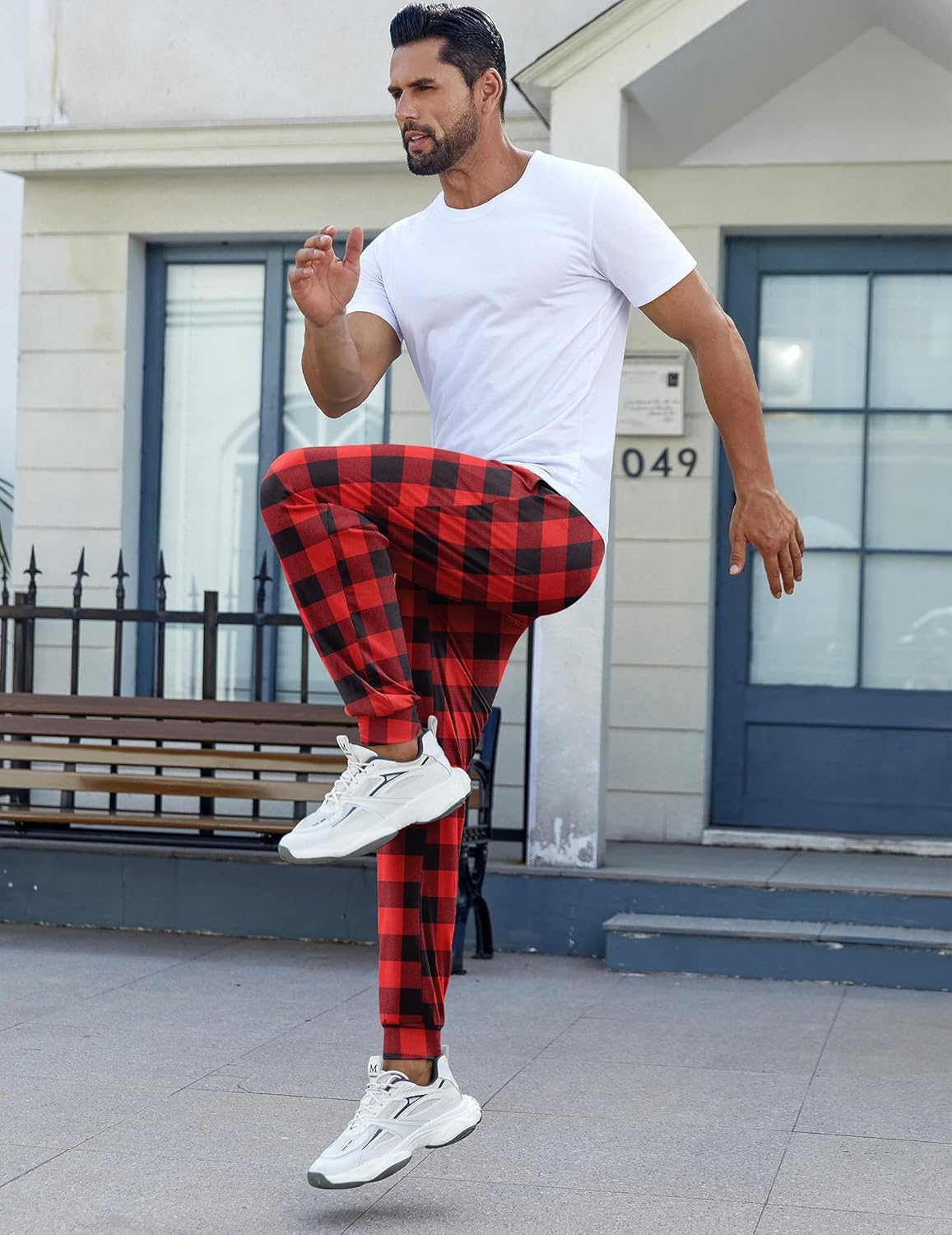Red and black plaid pajama pants, tapered leg and elastic waistband