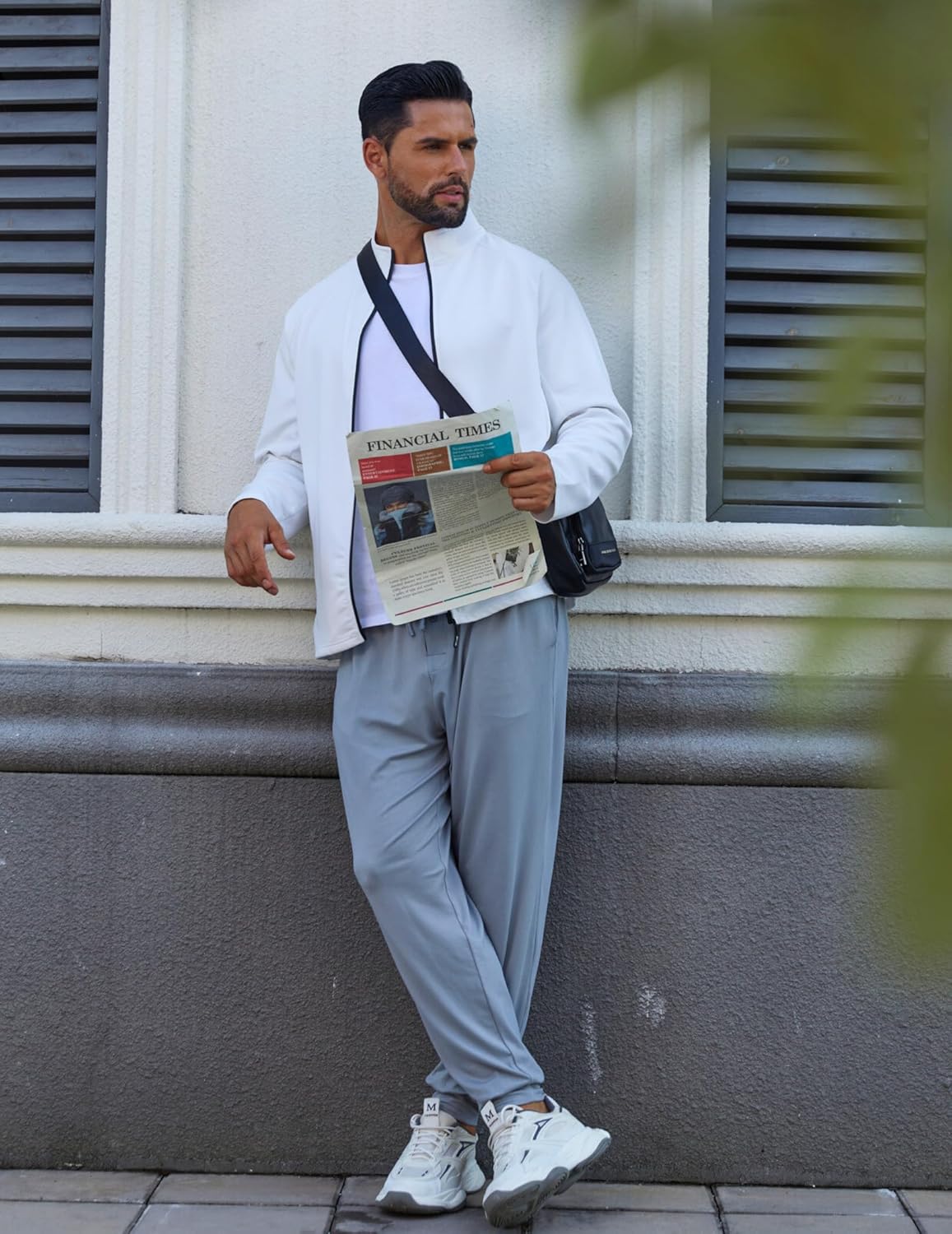 Light gray pajama pants with elastic waistband and straight, slightly tapered legs
