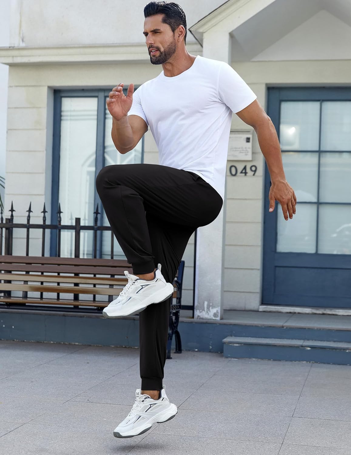 Men’s black lounge pants with cuffed ankle and drawstring closure