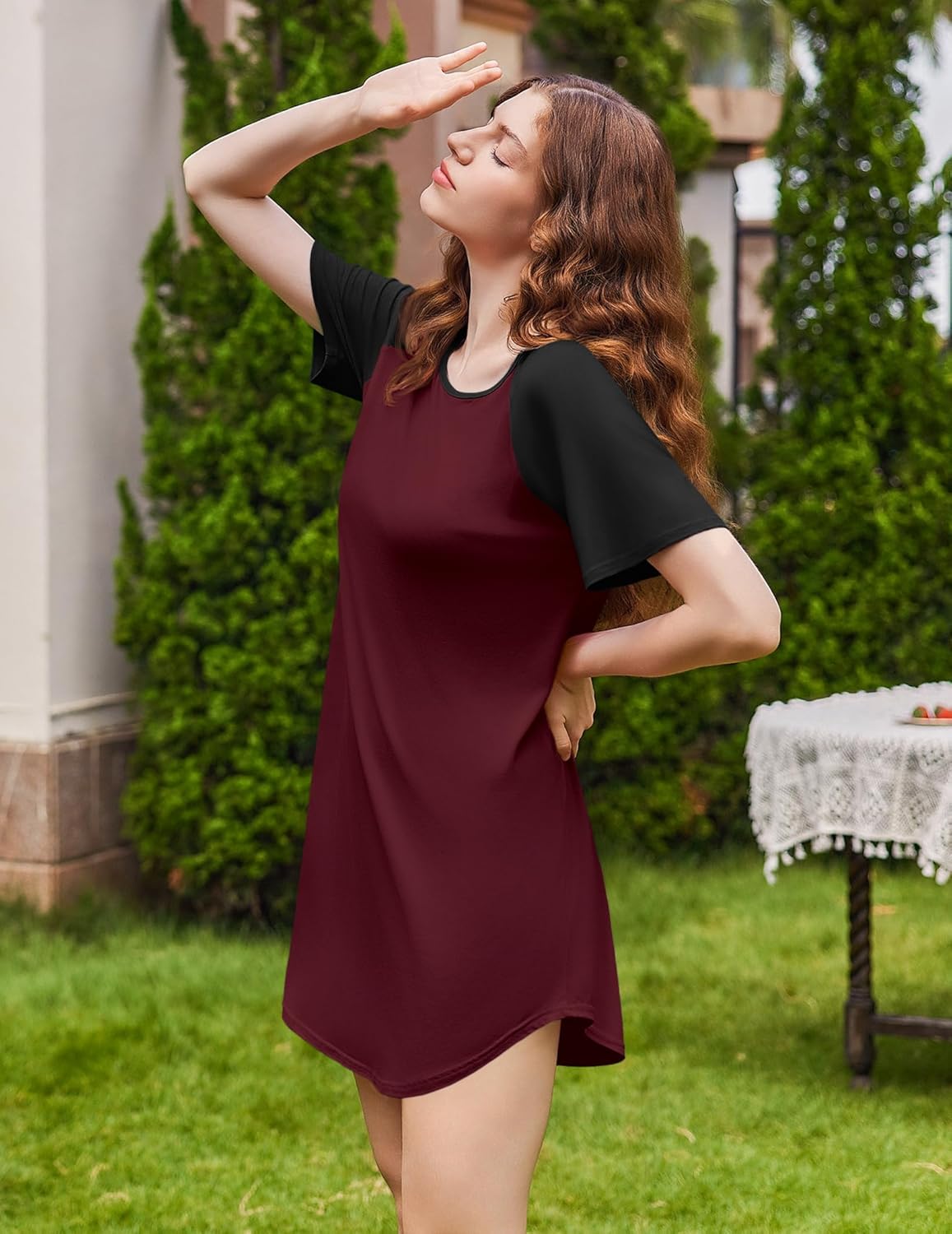Wine red nightgown with black raglan sleeves, crew neck, above-knee length