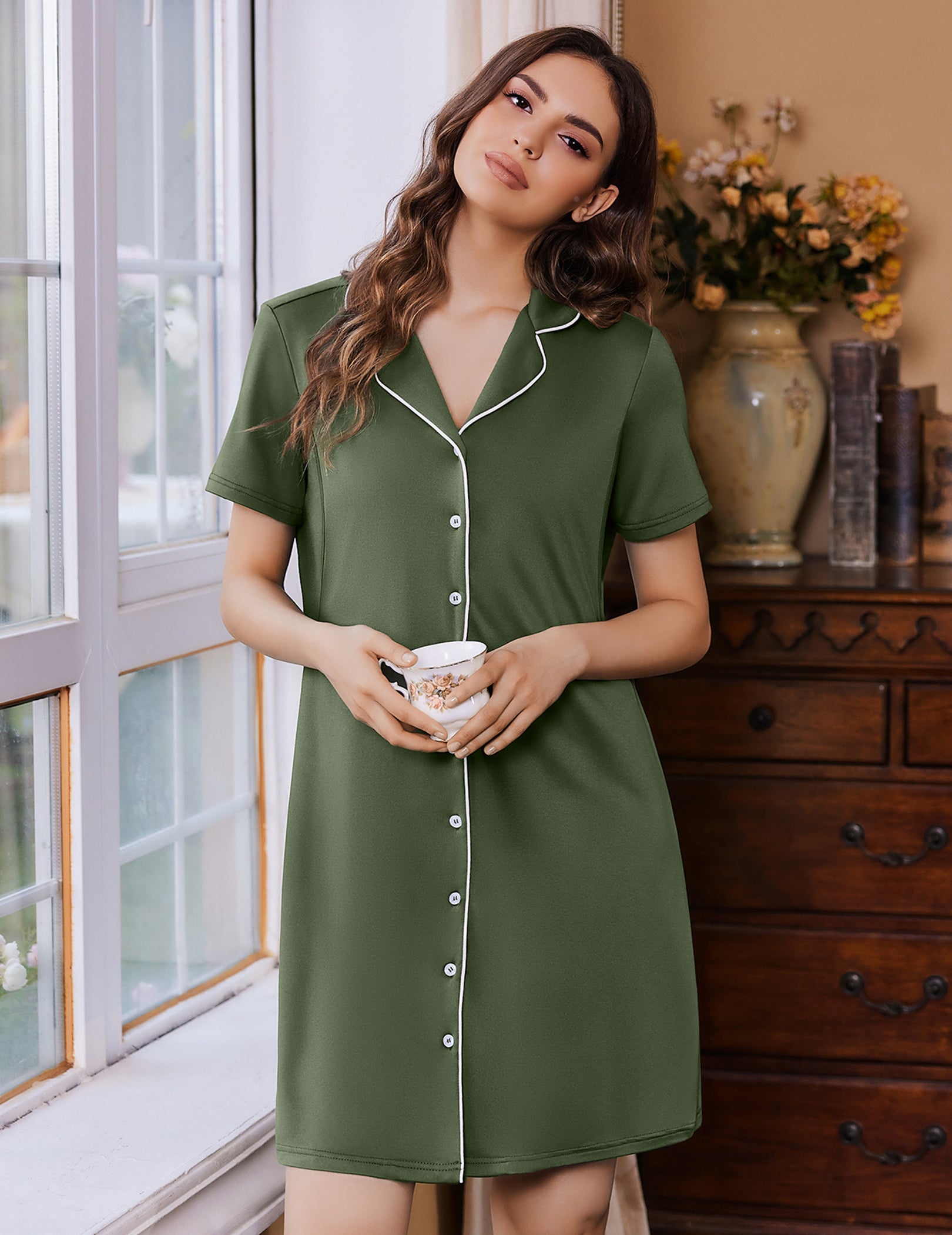 Green nursing nightgown dress with V-neck, button front, white trim, short sleeves
