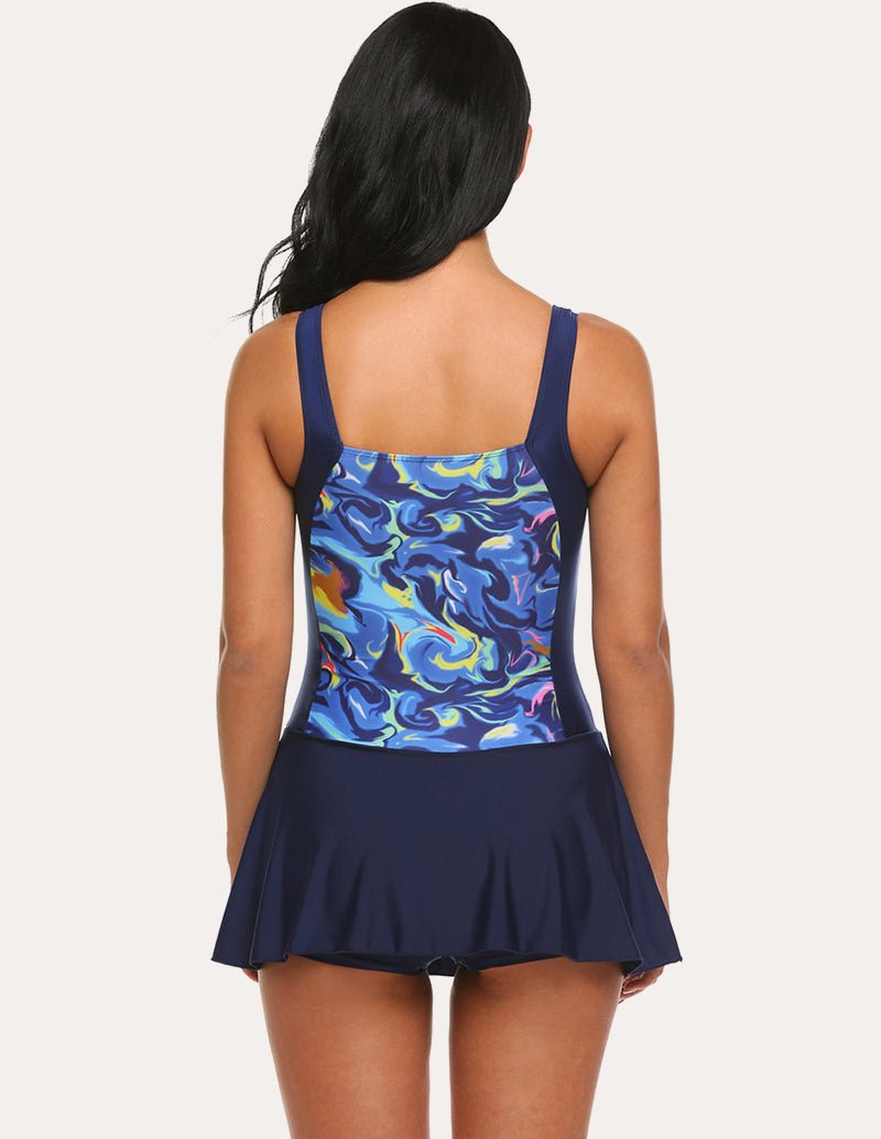 Navy one-piece skirted swimsuit with racerback straps and blue abstract print