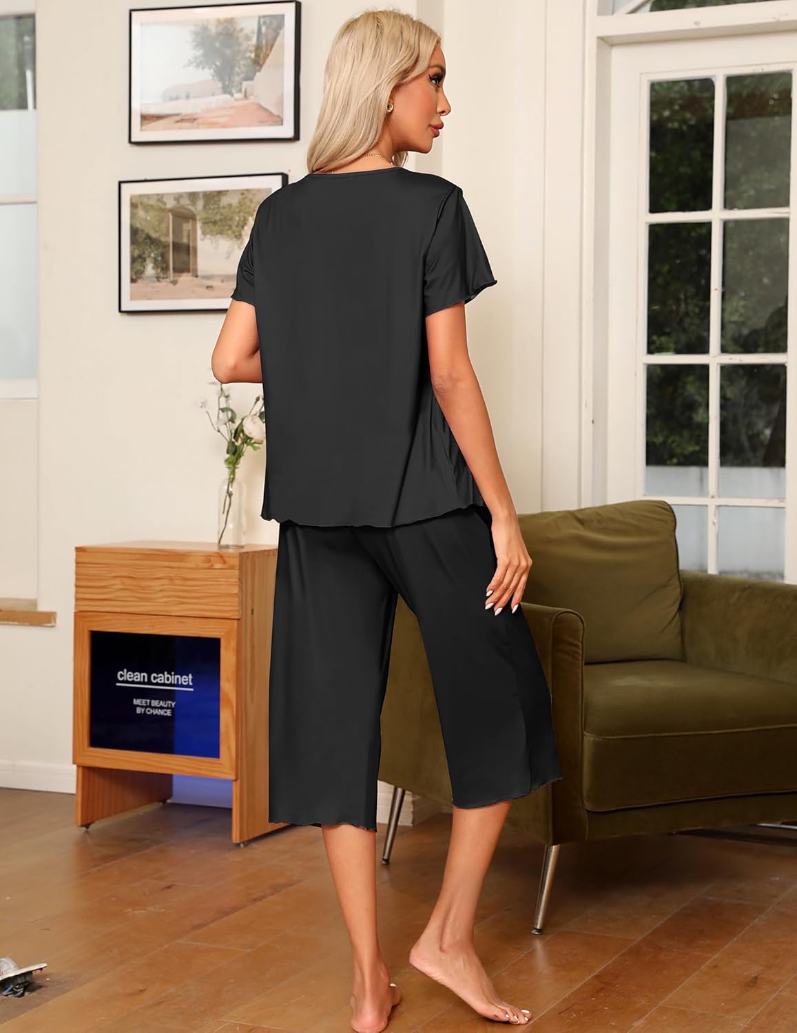 Black pajama set, back view with short-sleeve top and capri pants
