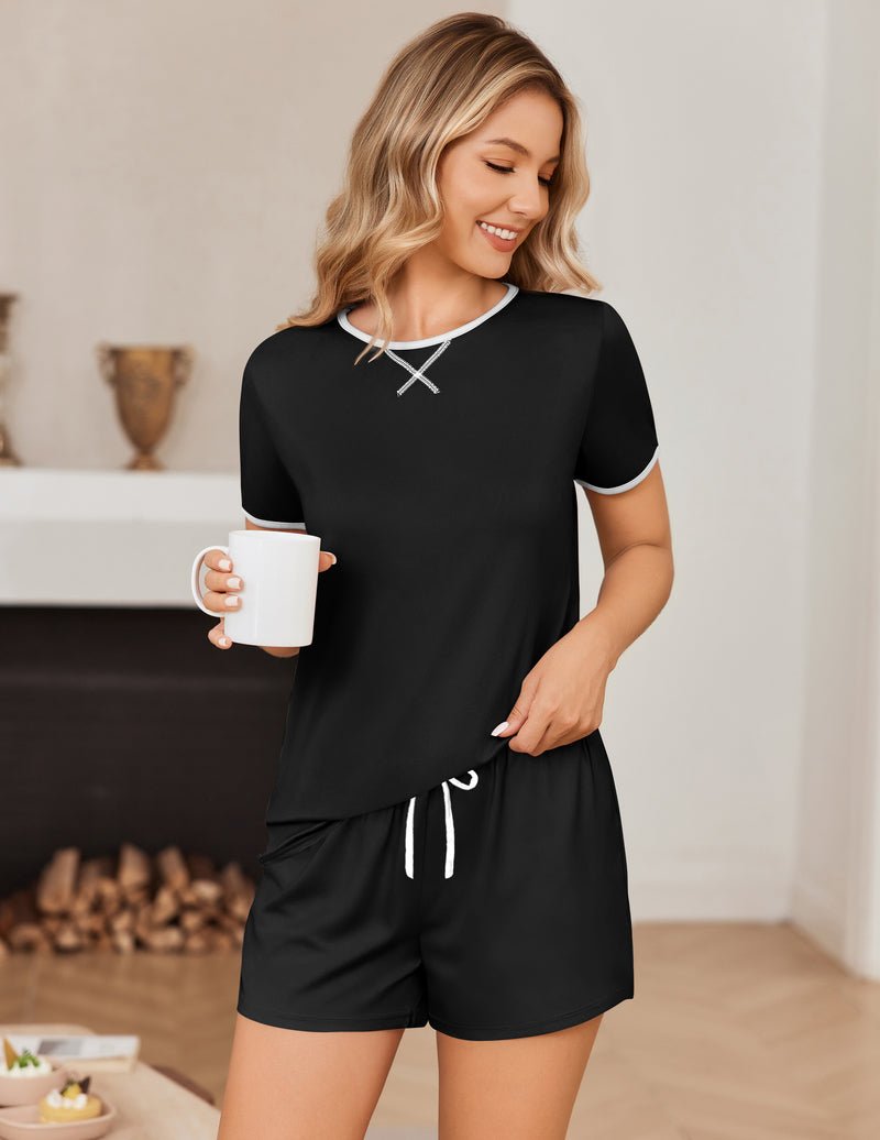 Black pajama set with white-trim crew neck and matching drawstring shorts