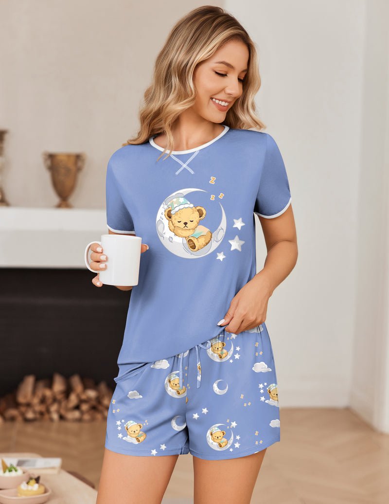 Blue pajama set with teddy bear moon print, short-sleeve top and matching shorts