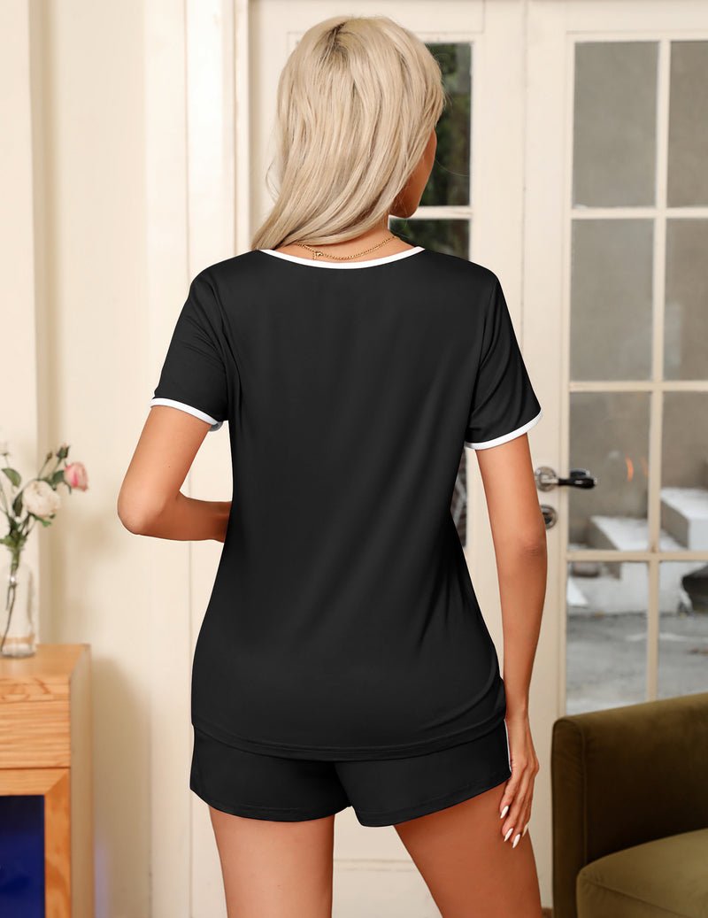 Black 2-piece pajama set, back view: contrast-trim short sleeves and elastic drawstring shorts
