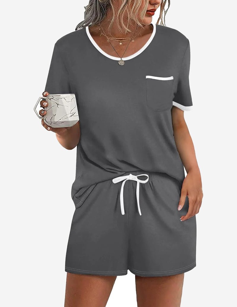 Dark gray 2-piece pajama set with contrast trim; chest pocket tee and drawstring shorts