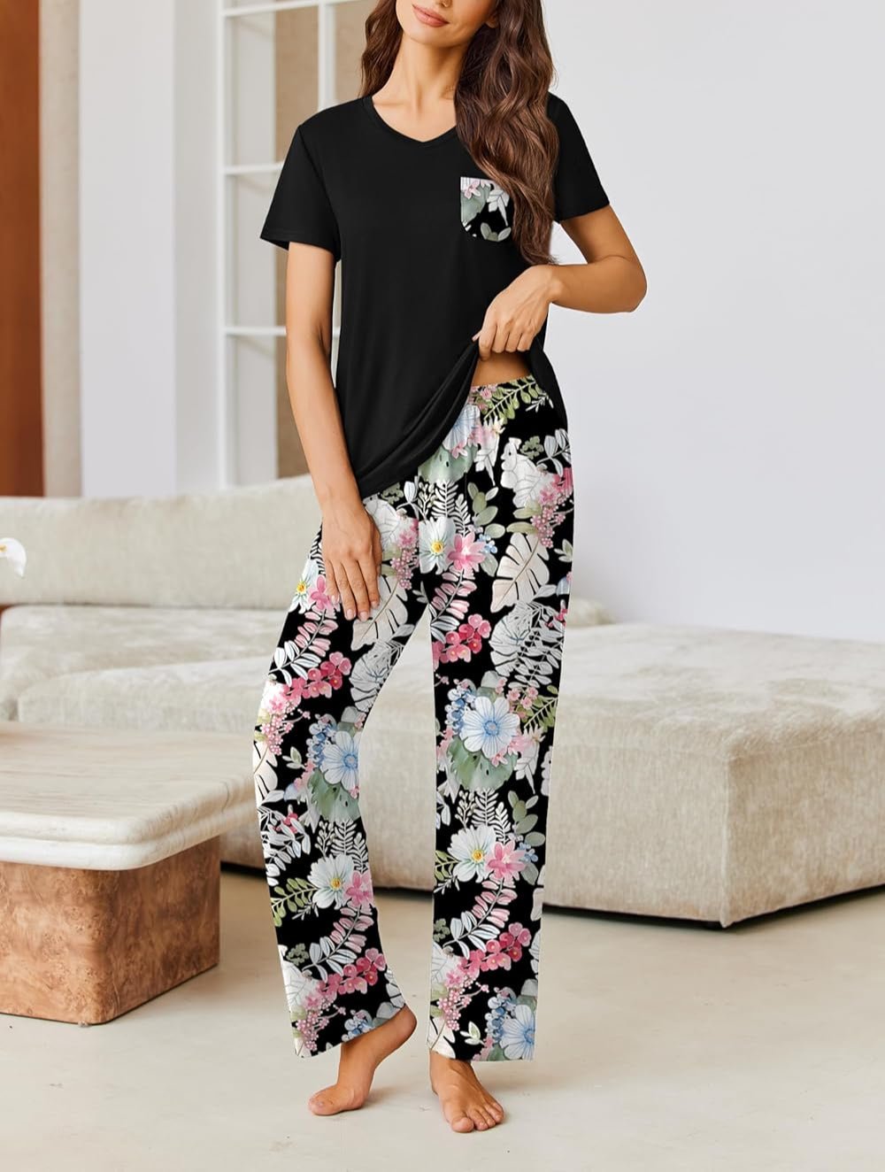 Black short-sleeve pajama set with floral print pants and chest pocket