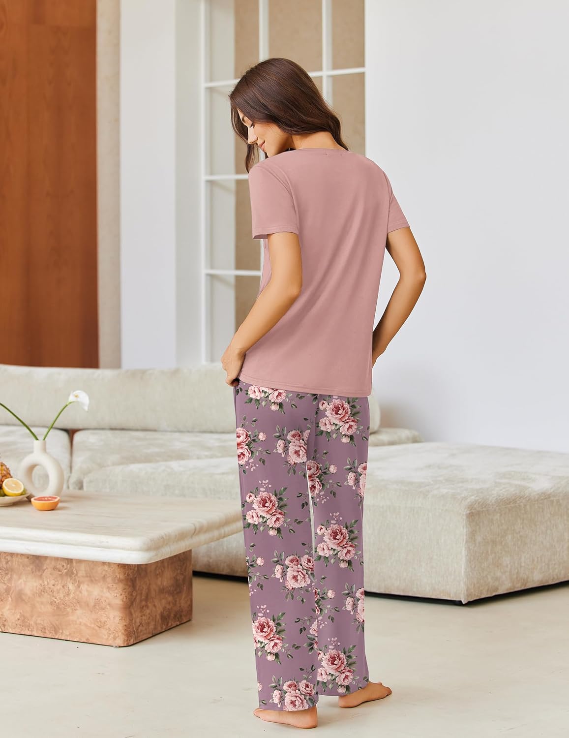 Two-piece pajama set with mauve short-sleeve top and pink floral wide-leg pants, back view