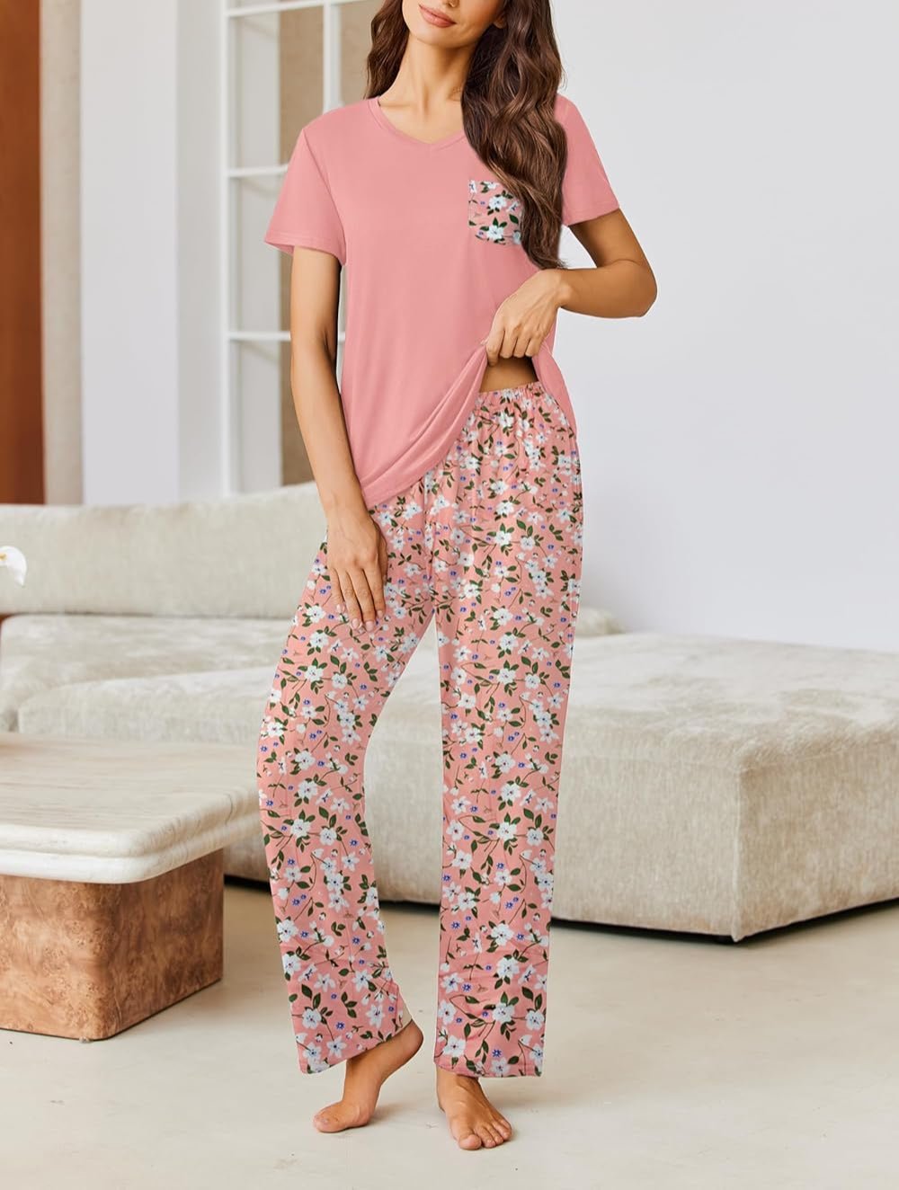 Women's pajama set with pink short-sleeve top and pink floral wide-leg pajama pants