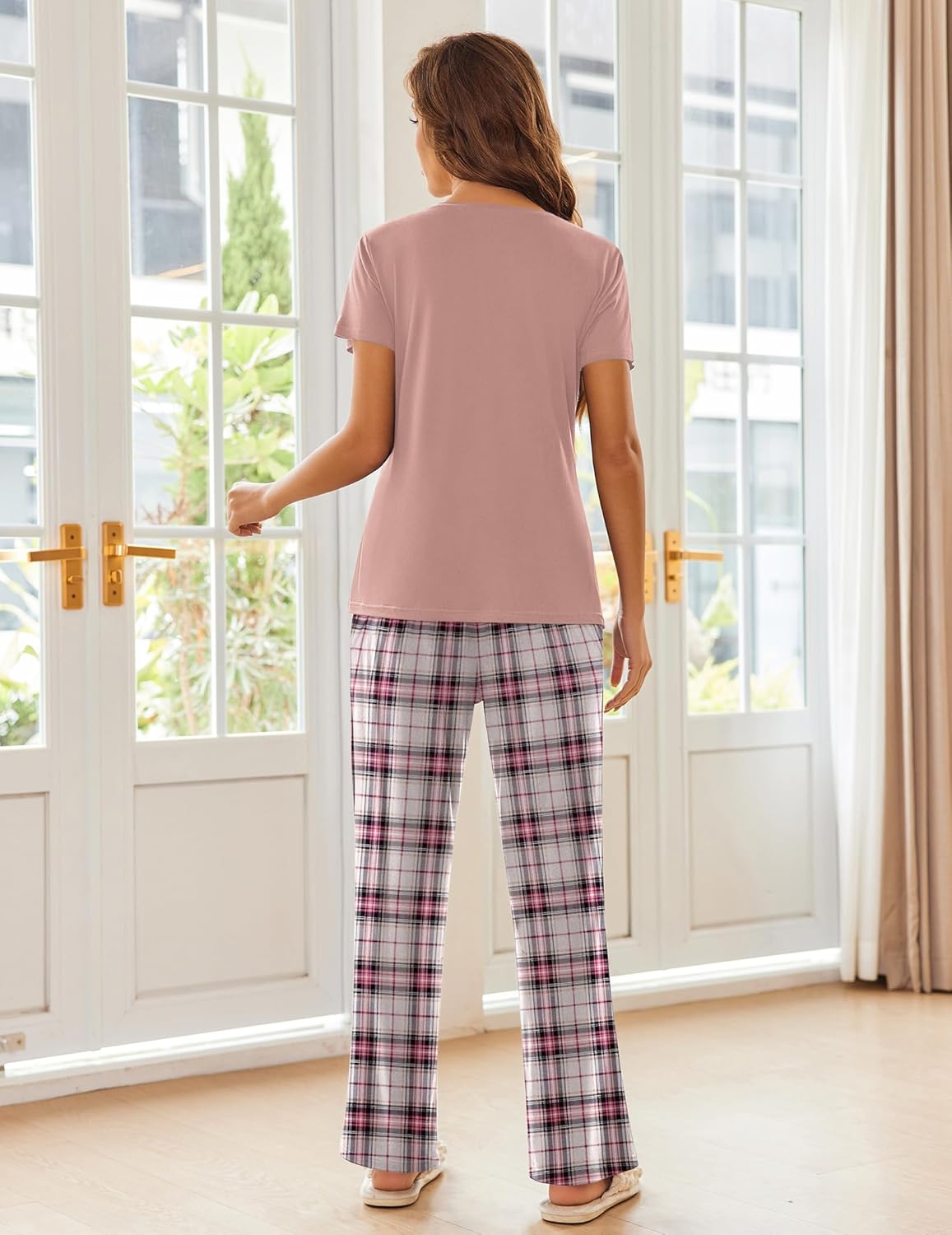 Two-piece pajama set with pink short-sleeve top and plaid wide-leg pants