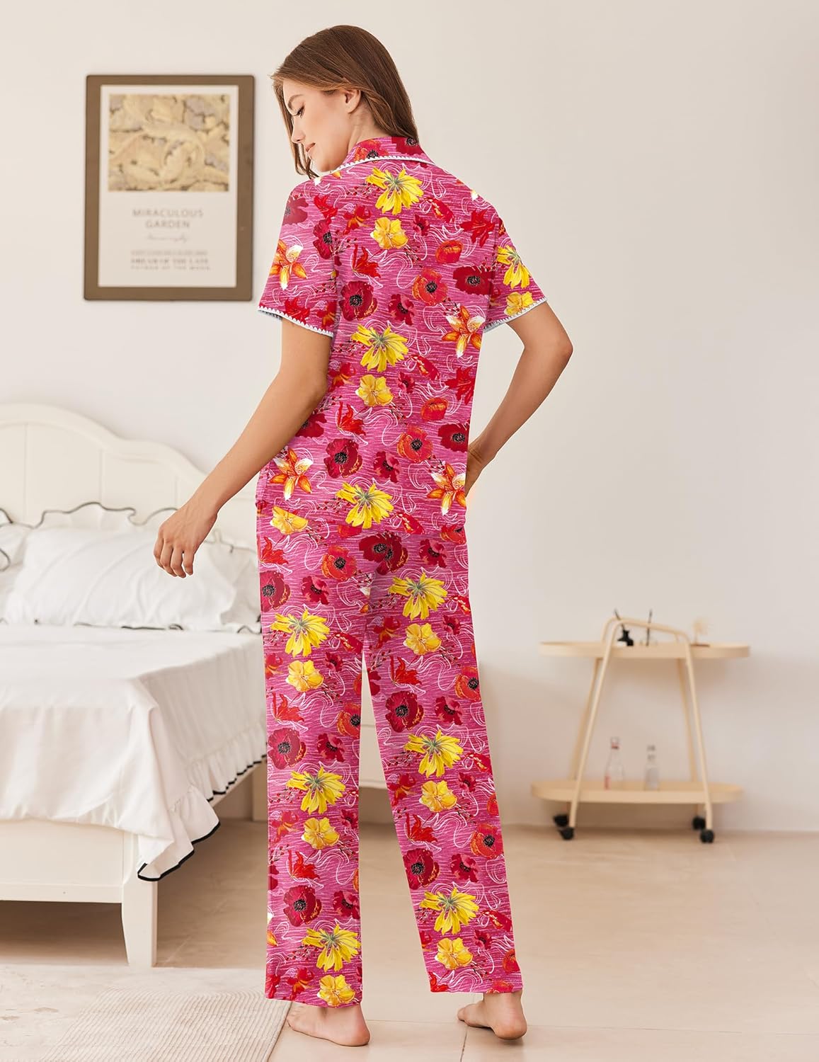 Women’s pajama set with short-sleeve button front and wide-leg pants, pink floral print back view