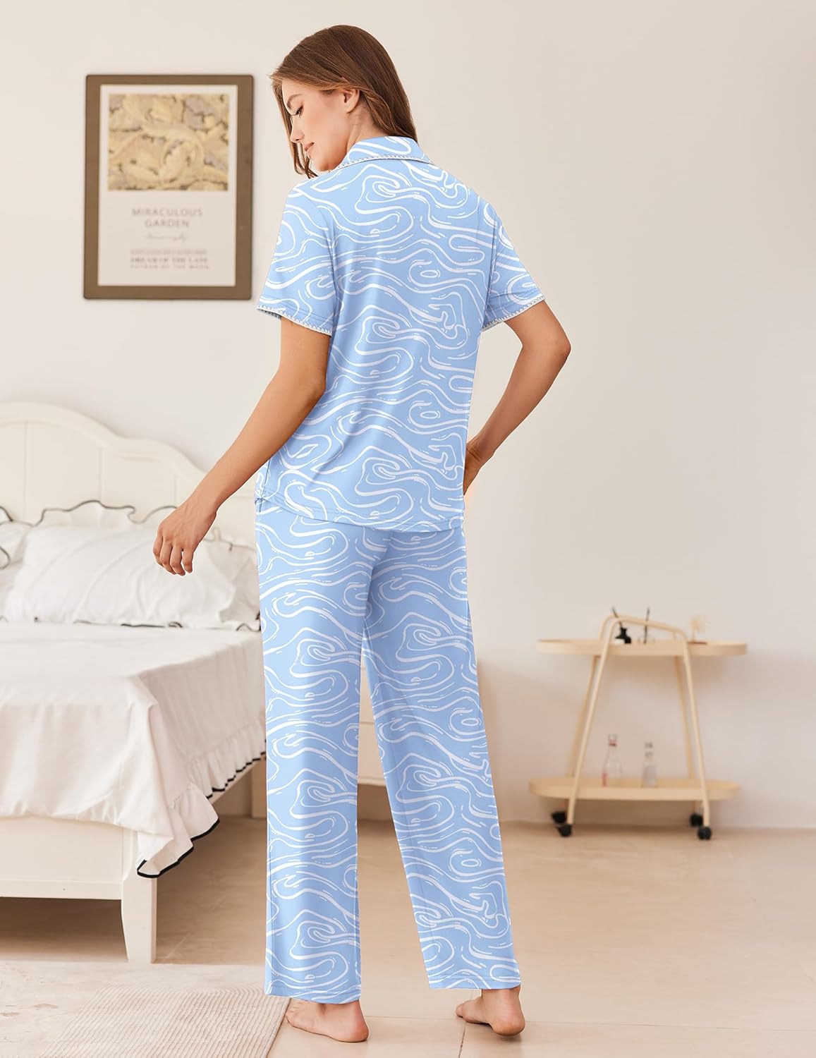 Women’s pajama set with short-sleeve button front and wide-leg pants, light blue wave print