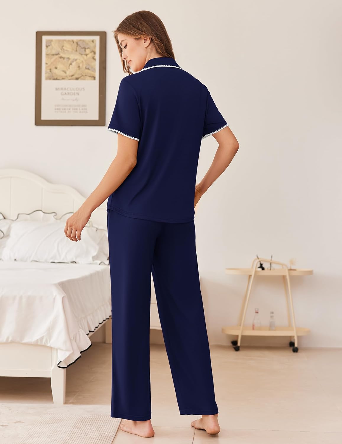Navy blue pajama set with short-sleeve button top and wide-leg pants, back view