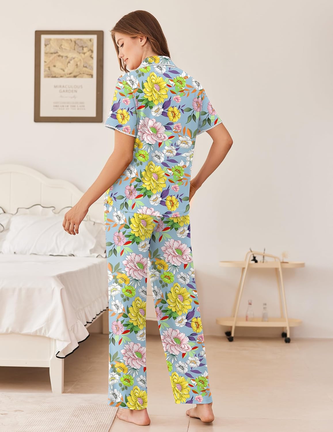 Floral button-down pajama set with short sleeves and long pants, blue base