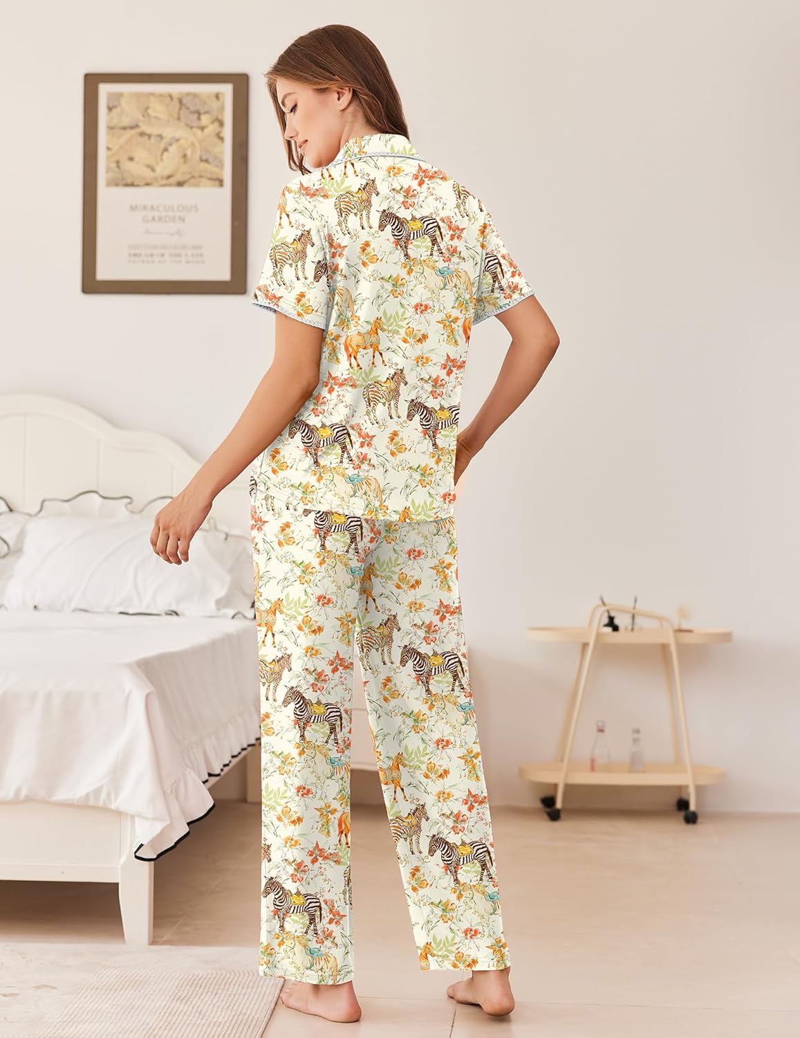 Printed button-down pajama set with short sleeves and long pants, white and yellow tones