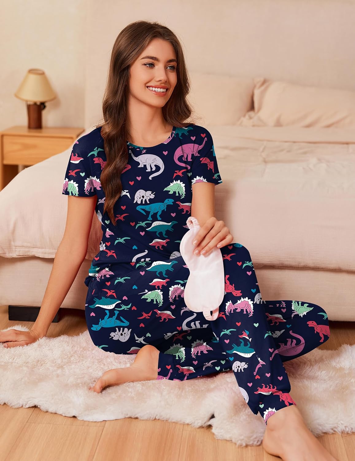 Navy dinosaur print short-sleeve pajama set with matching long lounge pants