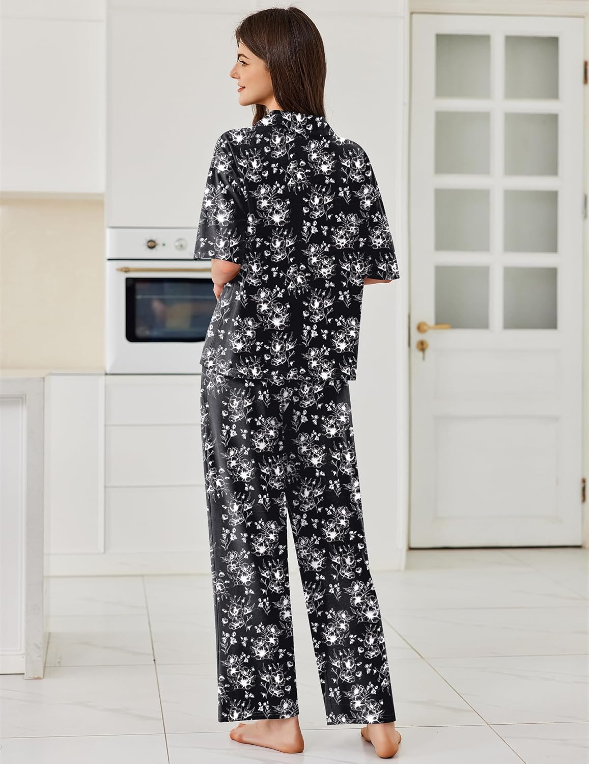 Black floral-pattern pajama set back view, button-up top with long straight-leg pants