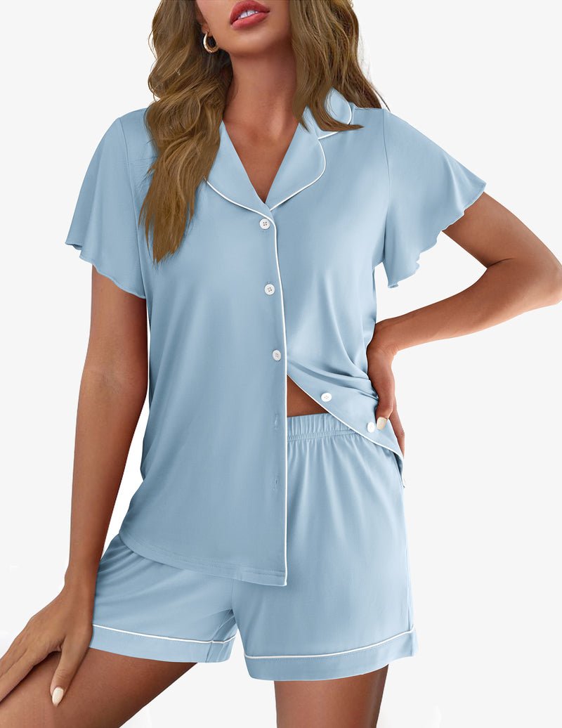 Light blue pajama set with short-sleeve button-up shirt and drawstring shorts
