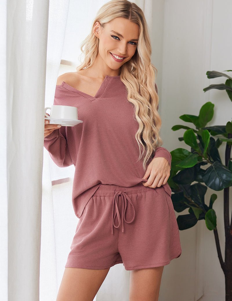 Brick red waffle-knit lounge set, long sleeves and drawstring waist shorts.