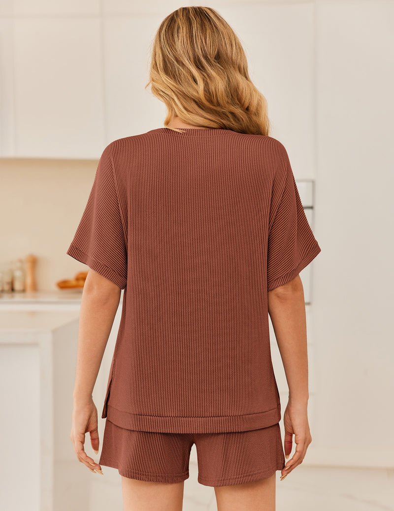 Back view: ribbed 2-piece lounge set with short-sleeve top and shorts, terracotta